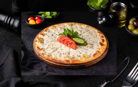 Akkawi cheese manakish in Dubai at Adam Restaurant & Cafe