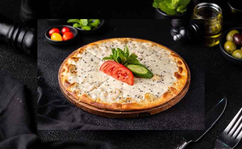 Akkawi cheese manakish in Dubai at Adam Restaurant & Cafe